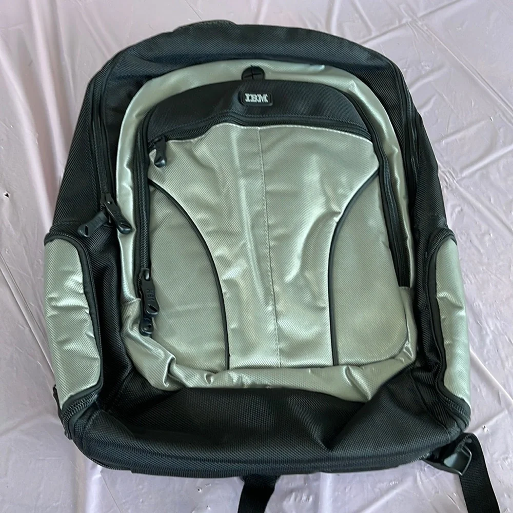 Backpack, NWOT, zipped, pockets, multi colored,
